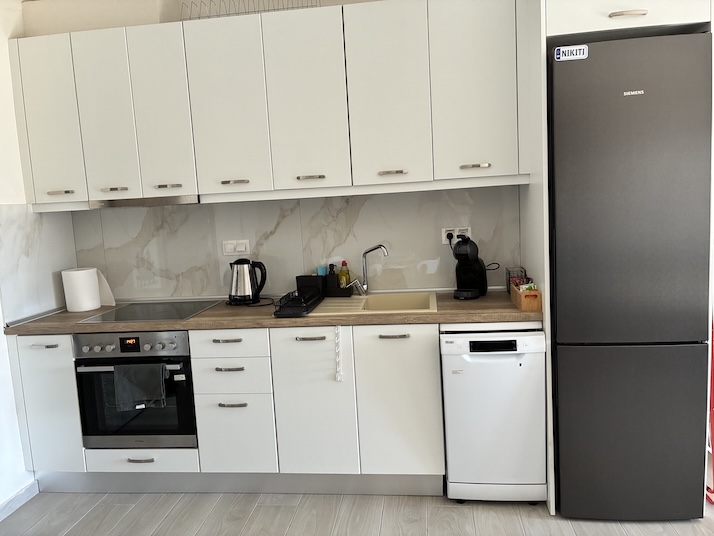 Fully equipped kitchen at Lora Family Apartment in Nikiti